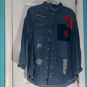 Distressed denim shirt with patches